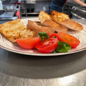Pan de cristal con tomate Restaurante en Comarruga